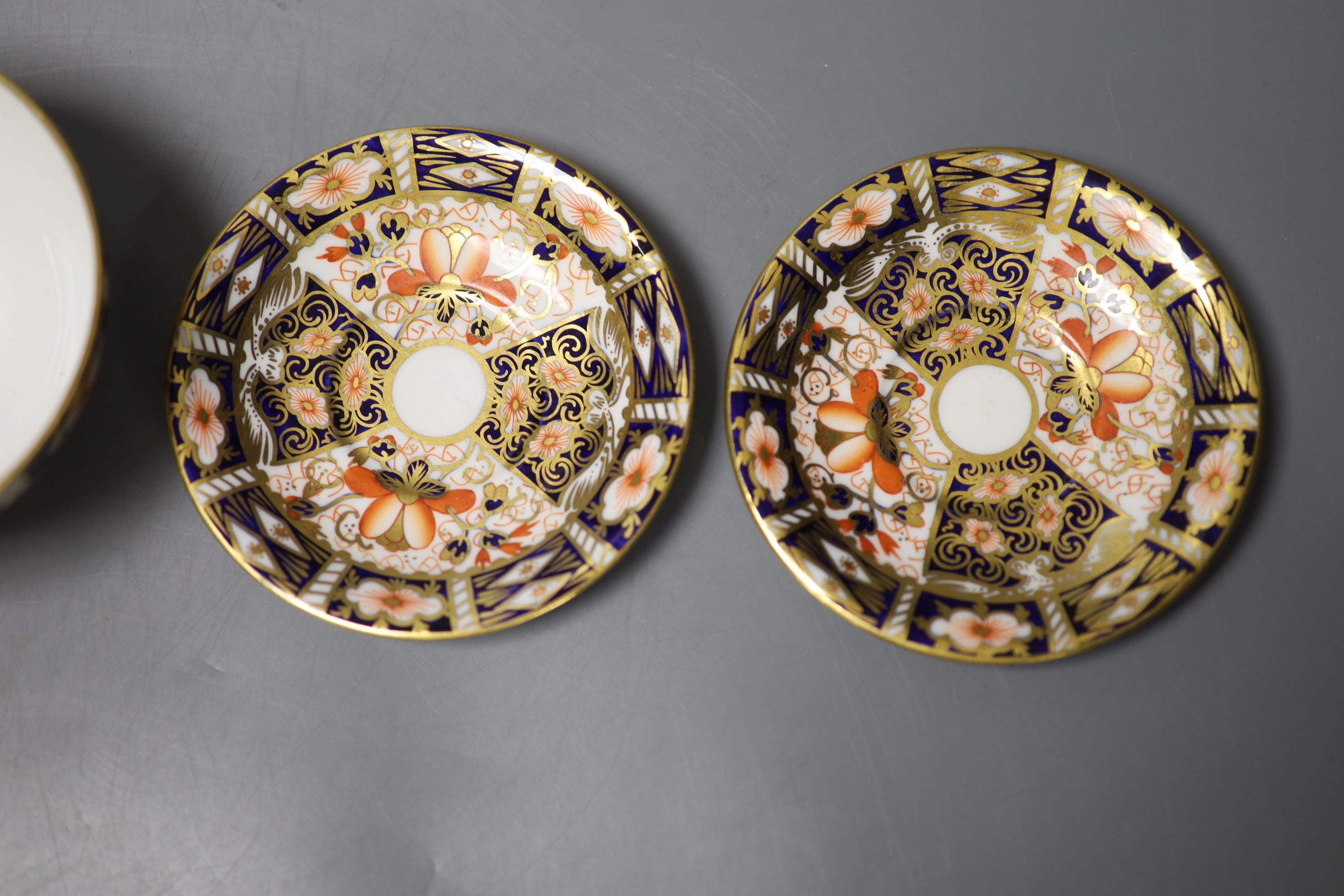 A pair of Royal Crown Derby coffee cups, imari pattern 2451, a coffee can and saucer and a sugar bowl